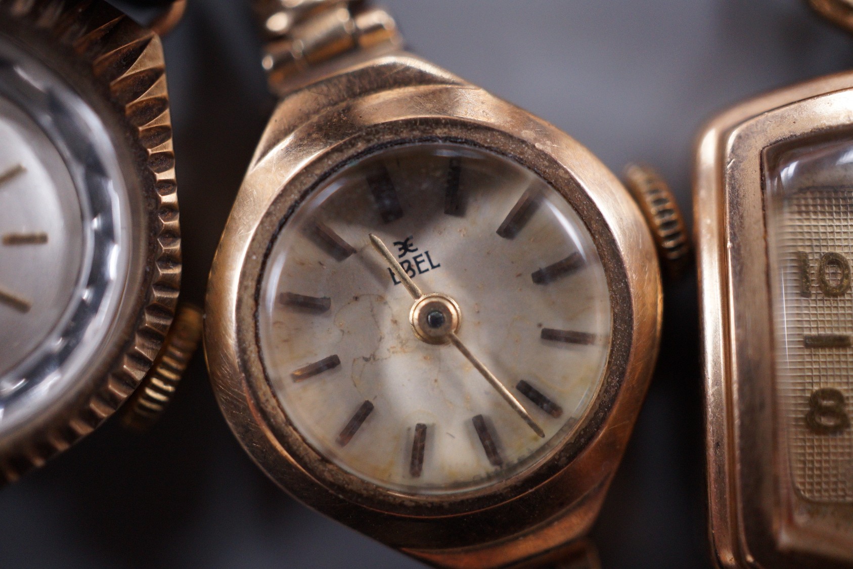 Two lady's 9ct gold manual wind wrist watches, Ebel & Majex, on 9ct bracelets, gross 25.6 grams and a lady's 9ct gold Regency manual wind wrist watch in a leather strap.